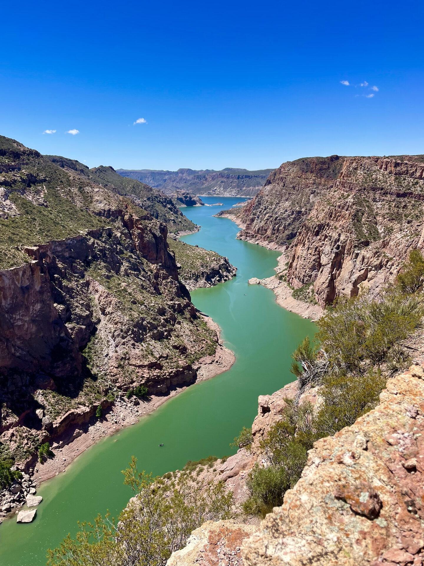 Turquoise canyon reservoir seen from above, near El Nihuil